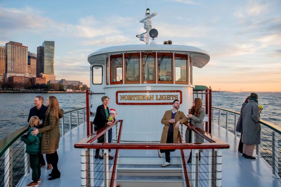 Boston: Cocoa and Carols Holiday Cruise - Boston Skyline Viewing From the Water: Bunker Hill, USS Constitution, Custom House Tower
