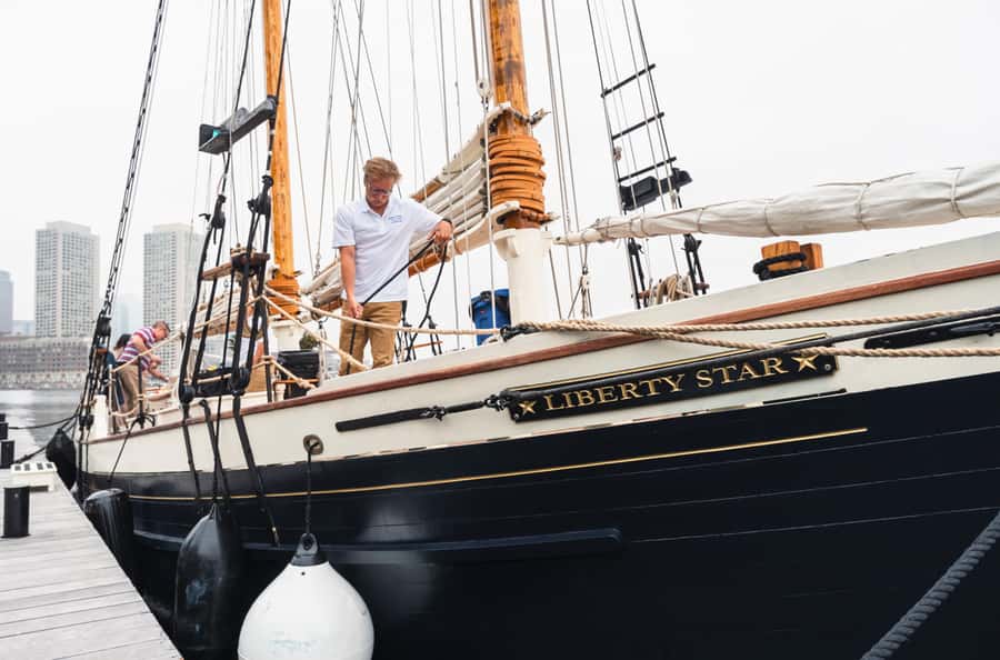 Boston: Sunset Tall Ship Harbor Cruise - Hoisting sails: the hands-on part you will remember
